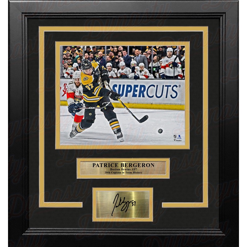 Patrice Bergeron in Action Boston Bruins 8" x 10" Framed Hockey Photo with Engraved Autograph